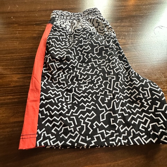 Chubbies Black and White Patterned Athletic Shorts with Red Accents - Picture 2 of 5